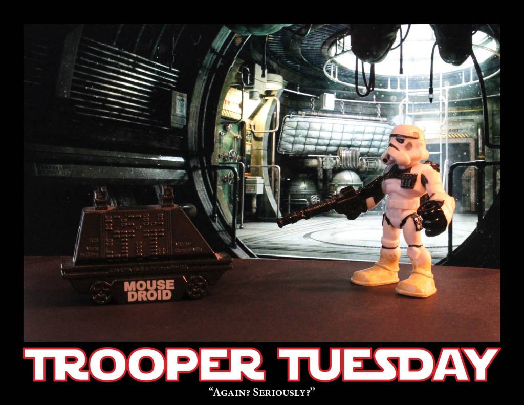 Sandy the Sandtrooper stands next to a large mouse droid.