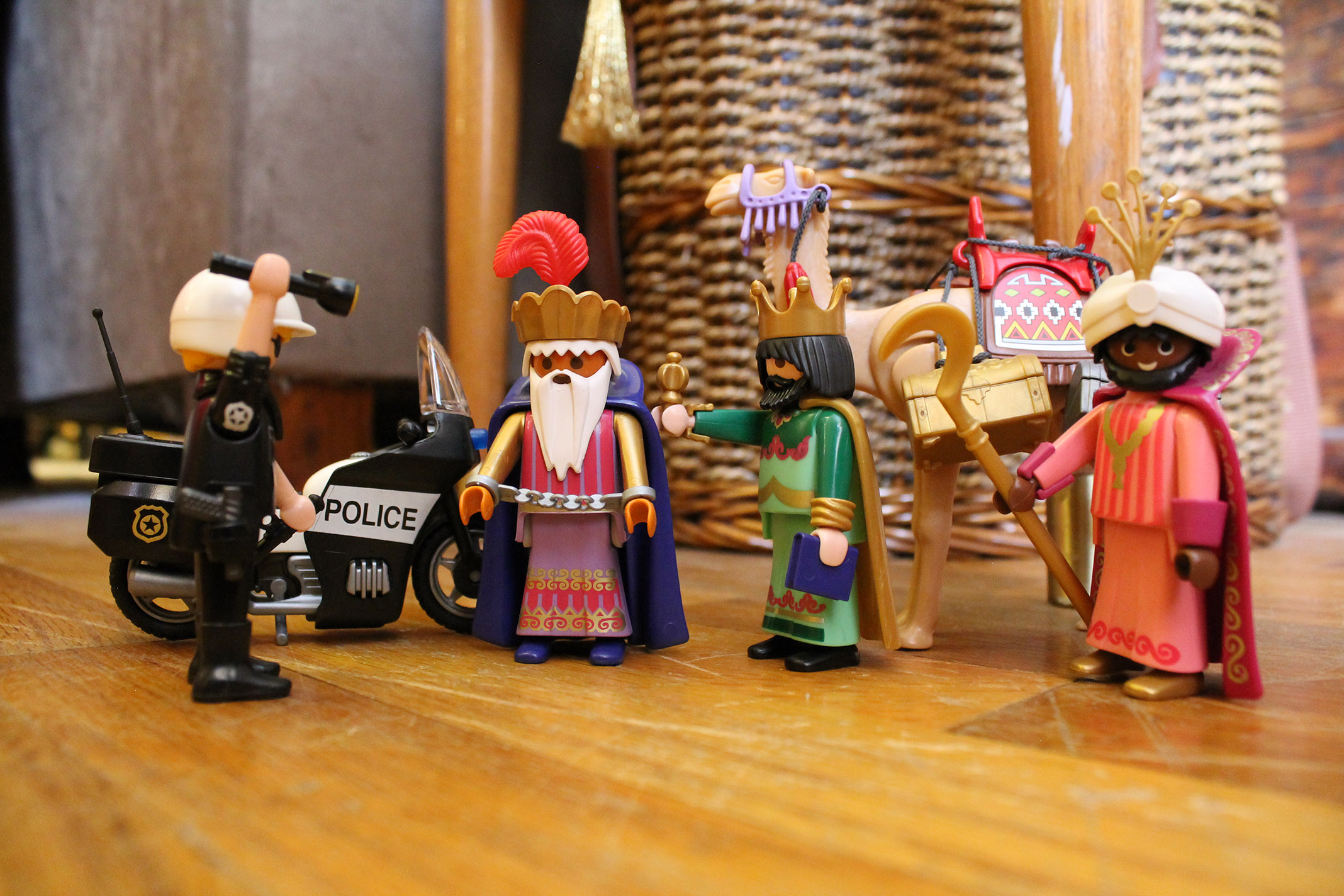 The three wisemen. Balthazar is getting arrested for driving the camel too fast.