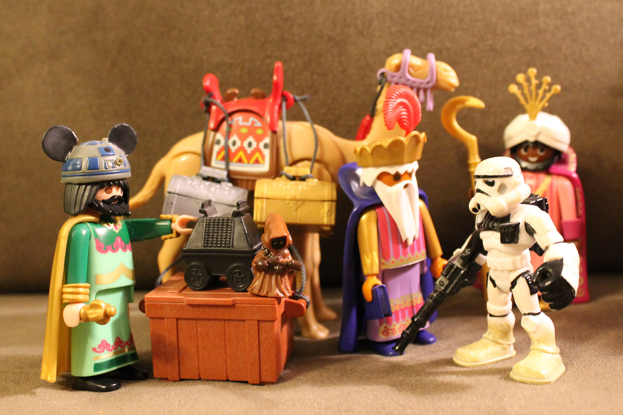 Three wisemen and a Sandtrooper with a Jawa.