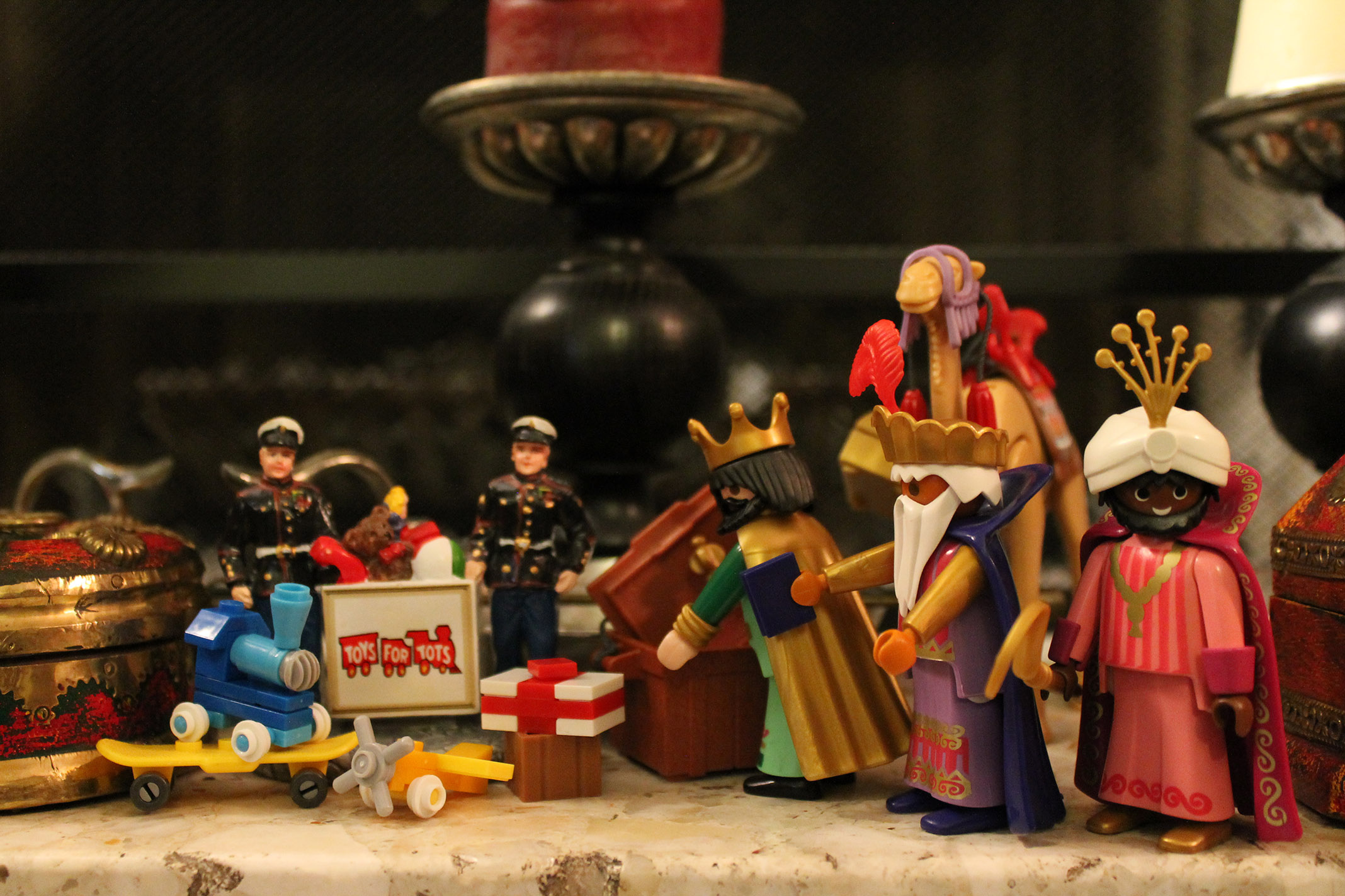 The wisemen give to Toys for Tots.