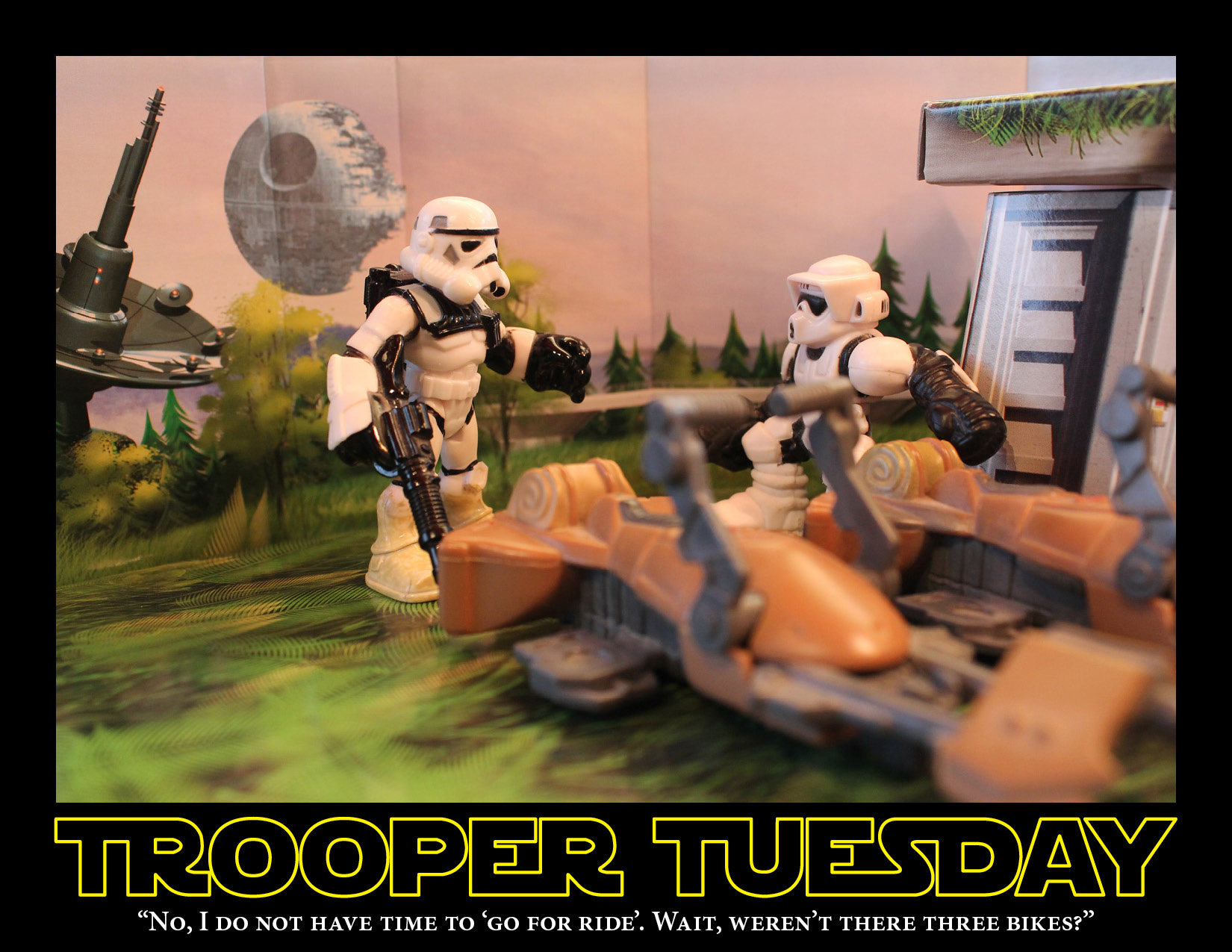 A Sandtrooper and Biker Scout stand near two speeder bikes, on Endor's moon.