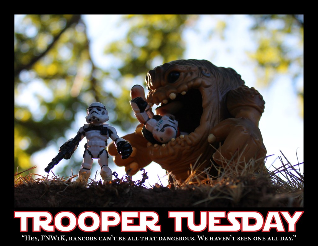 A Sandtrooper is eaten by a rancor while another Sandtrooper stands unawares.
